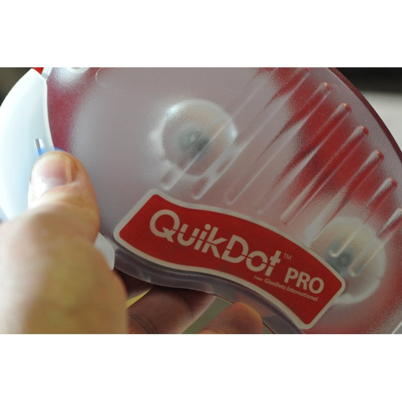 QuikDot Pro Dispenser held in hand